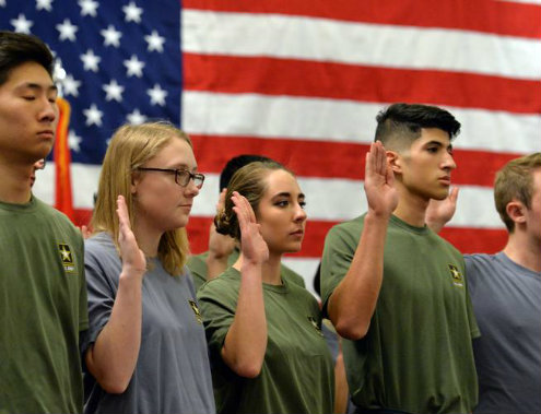 U.S. Army recruits are sworn in to service during the ceremony at the Best Western Plaza Hotel in Longmont. (David R. Jennings, Daily Camera)